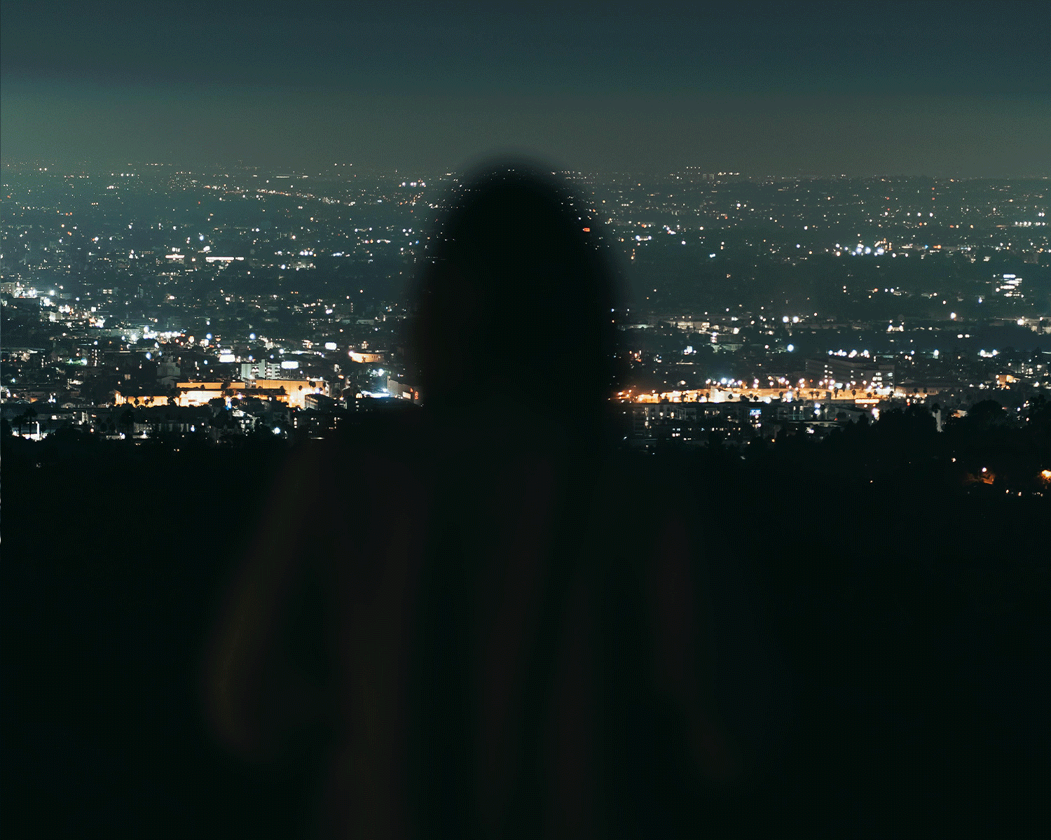 Gif of California governor, Gavin Newsom, and other images of mountains, ocean, and skylines to represent California.